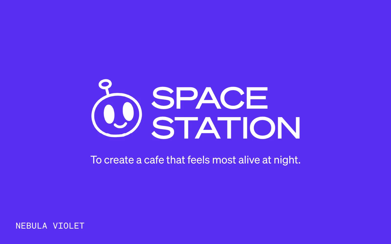The Space Station wordmark and smiling planet mark in white on violet, above the line To create a cafe that feels most alive at night.